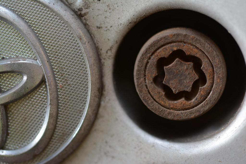 Close-up of a locking wheel nut on an alloy wheel
